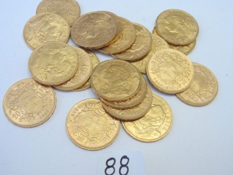 LOT de vingt PIÈCES de 20 F suisses en or jaune (900 millièmes