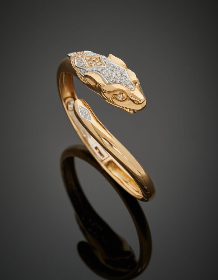 Mario FONTANA - BRACELET "panthère" rigide ouvrant en or jaune (750‰). La tête…