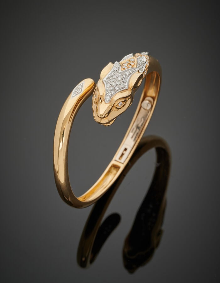 Mario FONTANA - BRACELET "panthère" rigide ouvrant en or jaune (750‰). La tête…