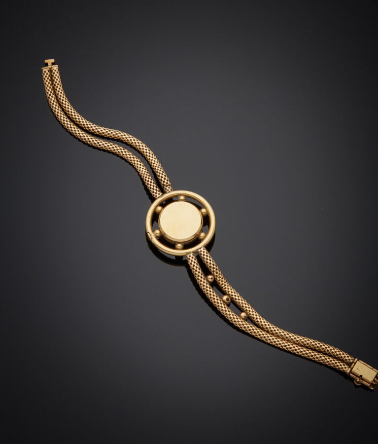 MELIK - BRACELET MONTRE "gouvernail" de dame en or jaune (750‰). Cadran crème (…
