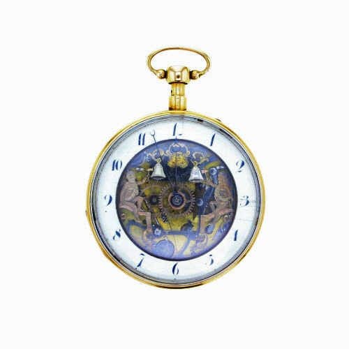 Montre à système en or jaune 18K (750°/00) au cadran squelette laissant apparaître le mouvement et un décor ajouré figurant deux puttos sonneurs de cloche