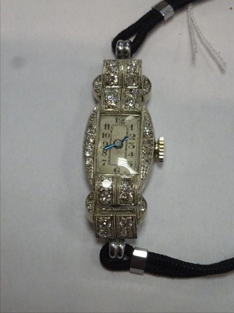 MONTRE bracelet de dame en or blanc 14K (585°/00