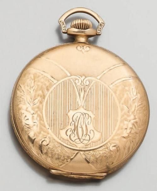MONTRE DE POCHE en or jaune 14 carats (585 millièmes) ciselé, guilloché et monogramm