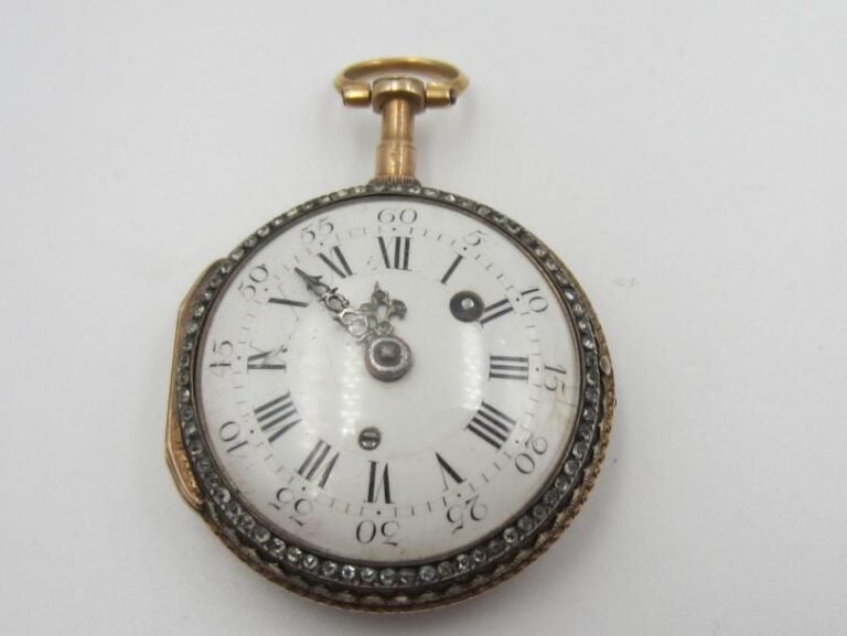 MONTRE DE POCHE en or jaune et rose (750 millièmes), et argent (mi