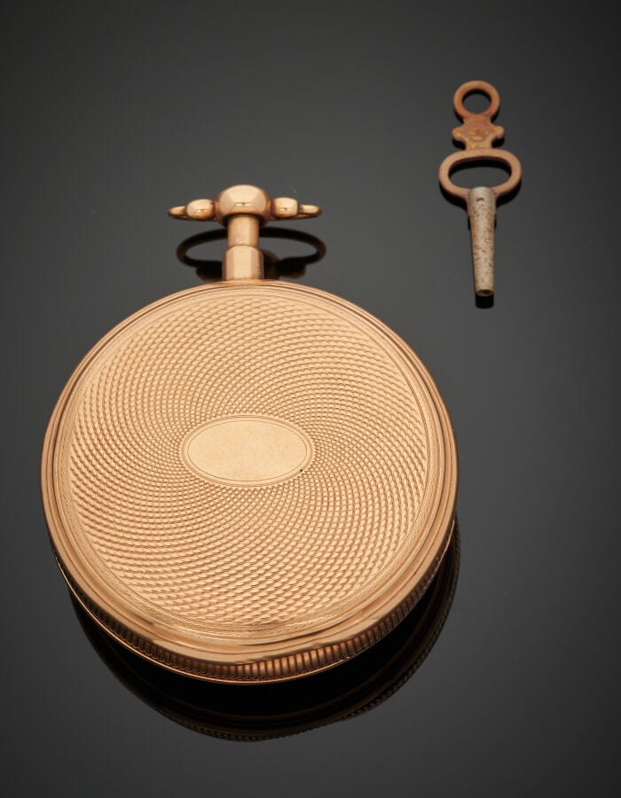 MONTRE de POCHE sonnerie au quart, en or jaune (750‰) guilloché. Carrure godron…