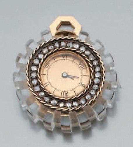 Montre pendentif en or jaune et altuglas crant