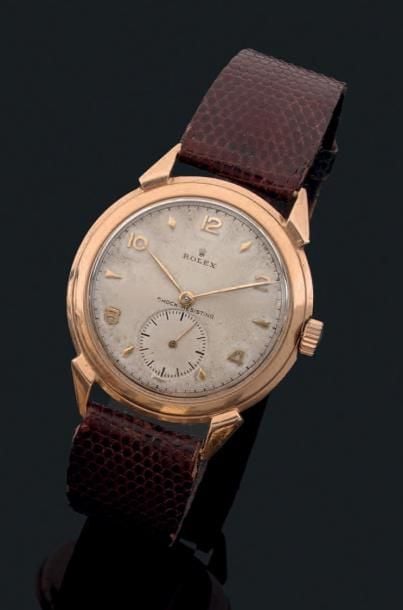 MONTRE ronde en or rose (750 millièmes