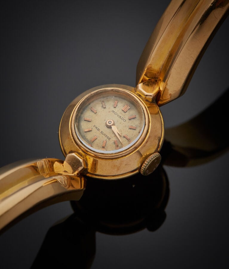 MOVADO - BRACELET MONTRE ronde de dame en or jaune (750‰). Bracelet en or semi…
