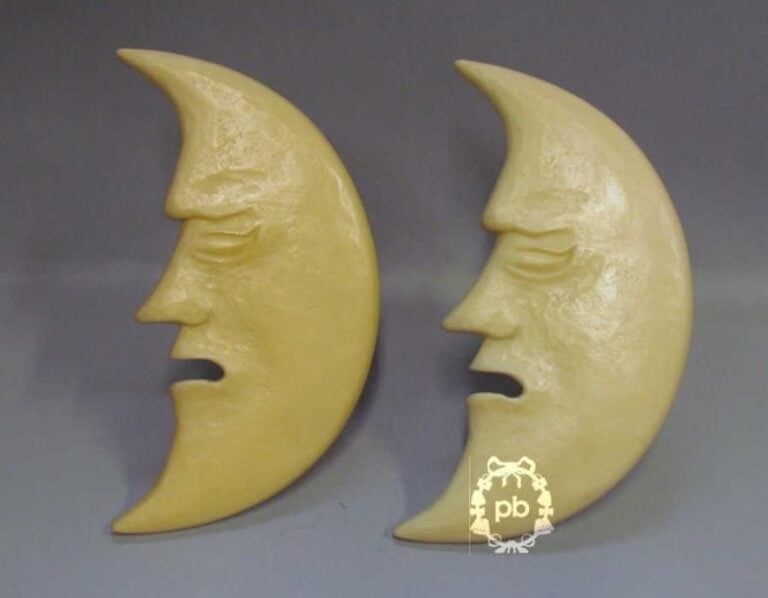PAIRE d'APPLIQUES 'croissants de lune' en résine ivoire
