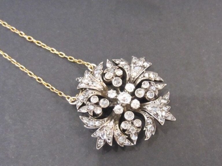 PENDENTIF en or rose (750 millièmes) et argent (mi
