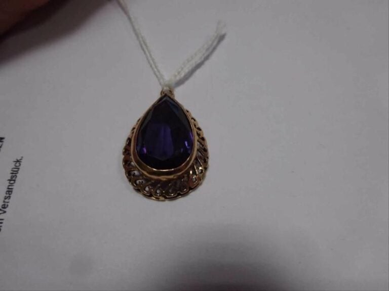 PENDENTIF goutte serti d'une améthyst