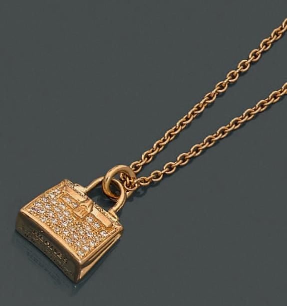 PENDENTIF «Kelly», et sa chaînette, en or rose (750 millièmes), pavé de diamants taille brillan