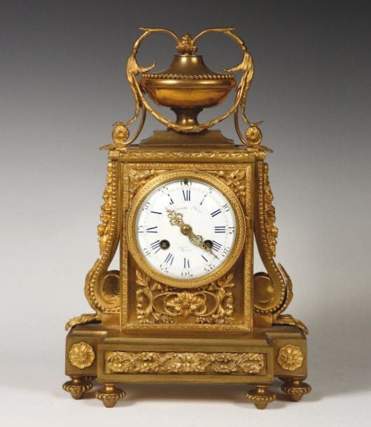 Pendule de Raingo Frères à paris en bronze ciselé dor