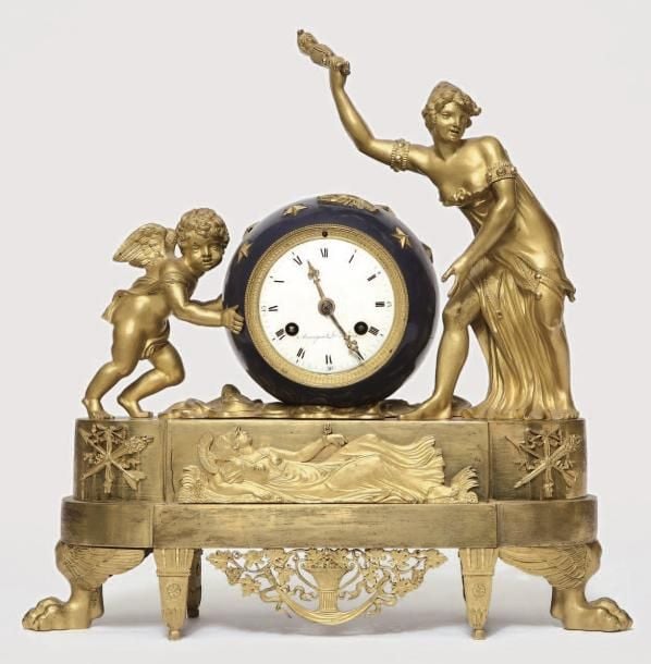 Pendule en bronze ciselé et doré à l'or mat et à l'or brillan