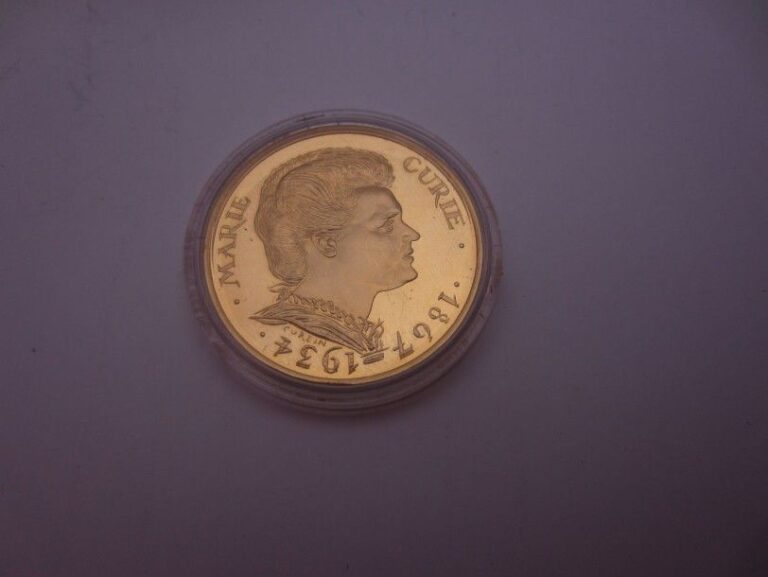 PIÈCE DE 100 FF «Marie Curie» en or jaune (920 millièmes) datée 193