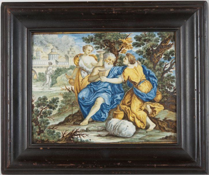 Plaque rectangulaire ornée d'un décor polychrome figurant le vieillard Laban s'enivrant avec ses fille