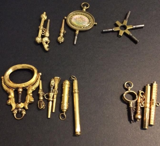 QUINZE CLEFS DE MONTRES DE POCHE: