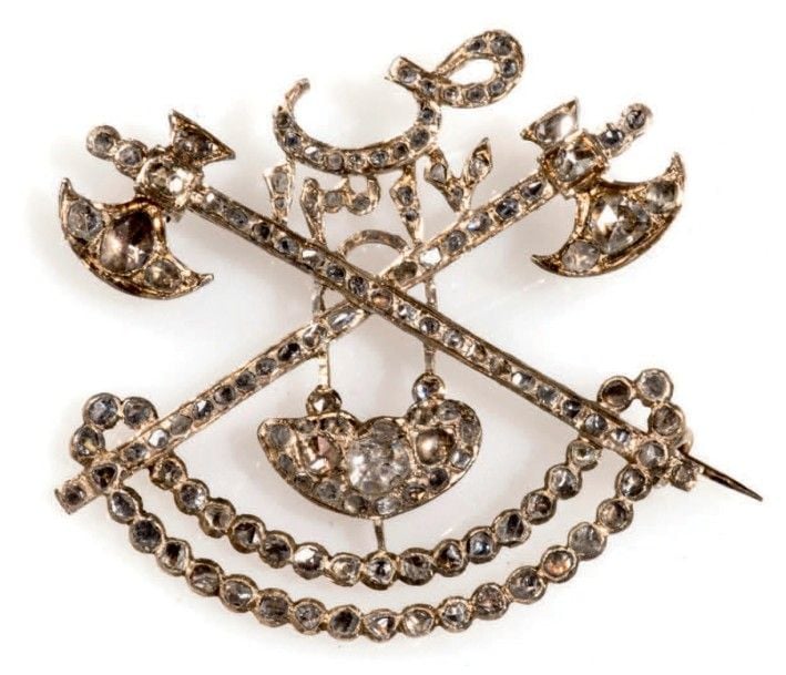 * Rare médaille Okhovat en or rose et diamants