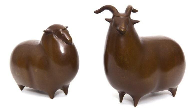 Représentations stylisées d'un bélier et d'une brebis en bronz