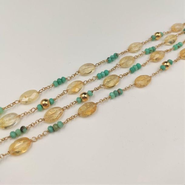 •SAUTOIR en vermeil (925‰) composé de perles de turquoises et citrines ovales facettée