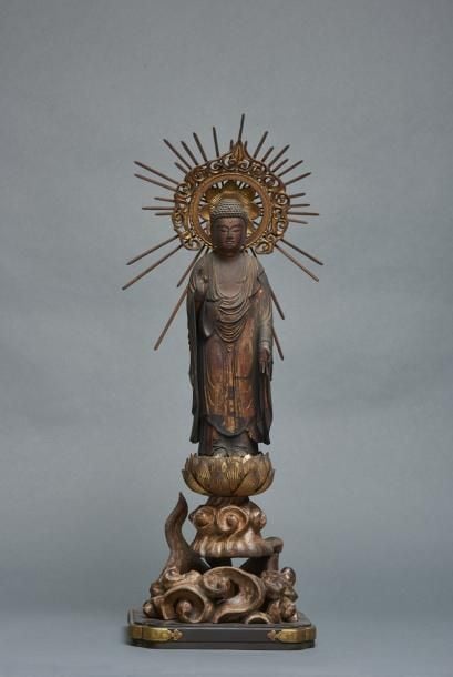 Statue en bois doré représentant Amida Raik