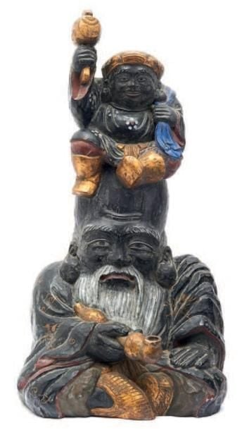 Statue en bois polychrome représentant la divinité de la longévité Fukurokuju, tenant à la main une pipe kiser