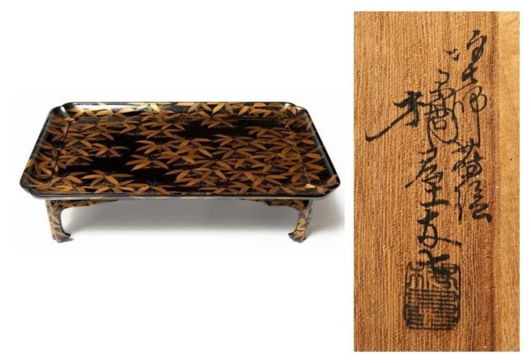 Table basse laquée noire avec bords aréhaussé