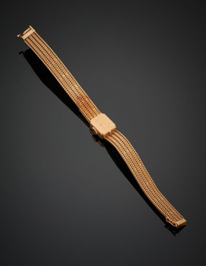 UTI - BLANCPAIN - BRACELET MONTRE "ceinture" carrée de dame en or jaune (750‰).…