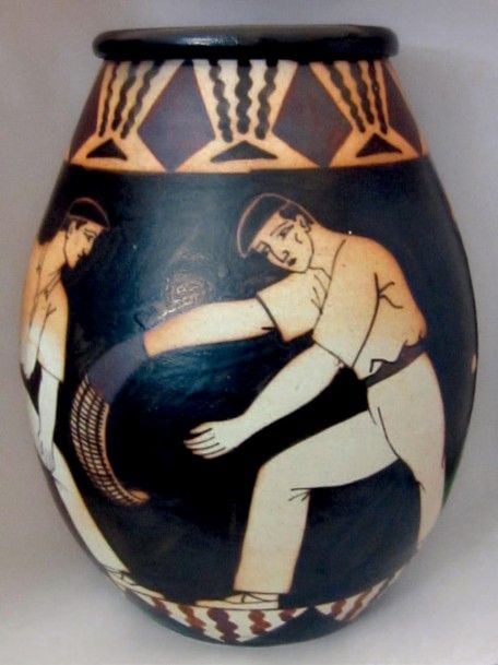 VASE OVOÏDE en grès sur fond noir, à décor tournant de pelotari entre deux frises géométrique