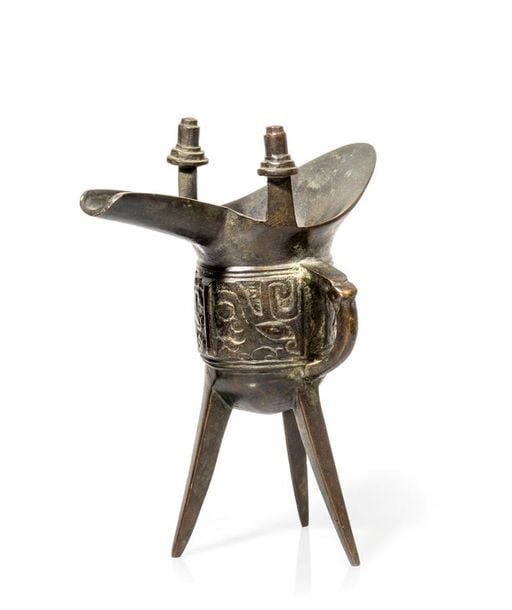 VERSEUSE TRIPODE EN BRONZE, JUE