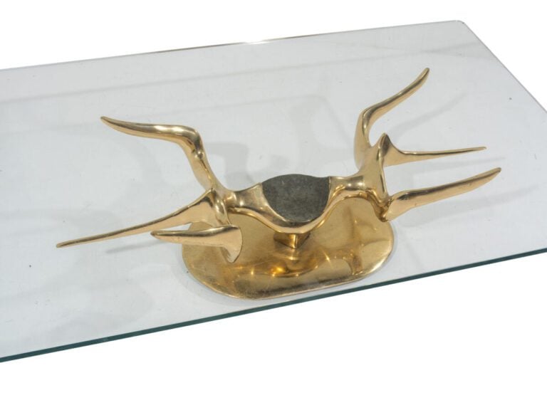 VICTOR ROMAN (1937-1995) - Table basse en bronze doré à - plateau rectangulaire…