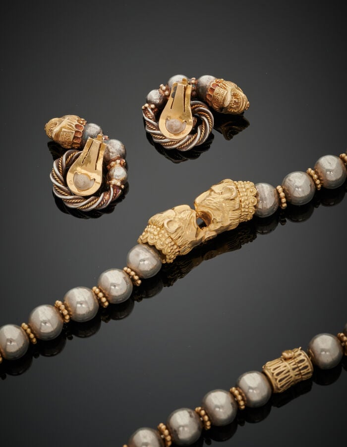 ZOLOTAS - DEMI-PARURE "têtes de lions" en or jaune (750‰) et argent (min. 800‰)…