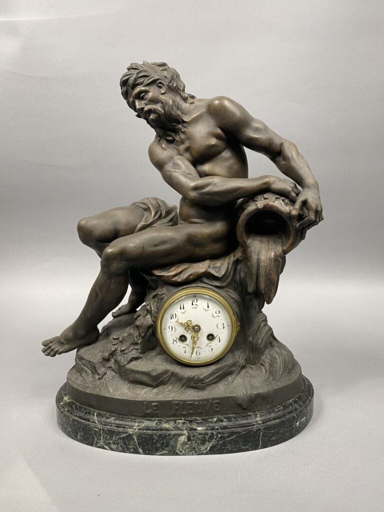 François MOREAU (1858-1931) d'après - Le fleuve - Pendule en régule figurant un…