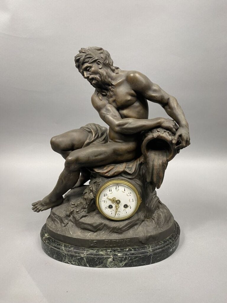 François MOREAU (1858-1931) d'après - Le fleuve - Pendule en régule figurant un…