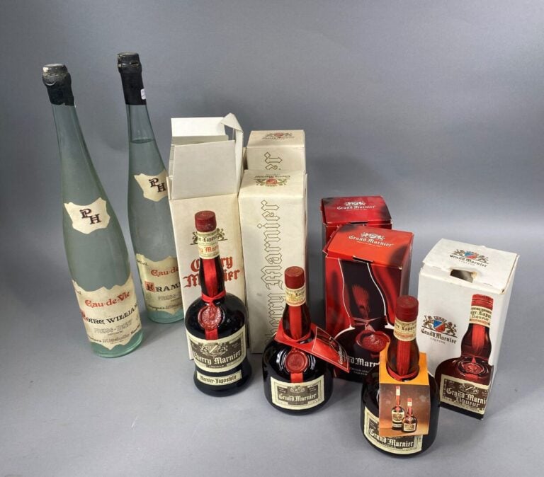 Lot d'eau de vie et liqueurs comprenant : - - Une bouteille de PREISS-HENNY, ea…