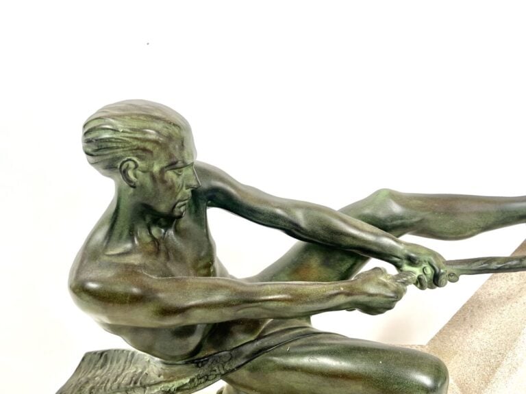 Max LE VERRIER (1891-1973) - Tireur de corde - Régule à patine verte sur socle…