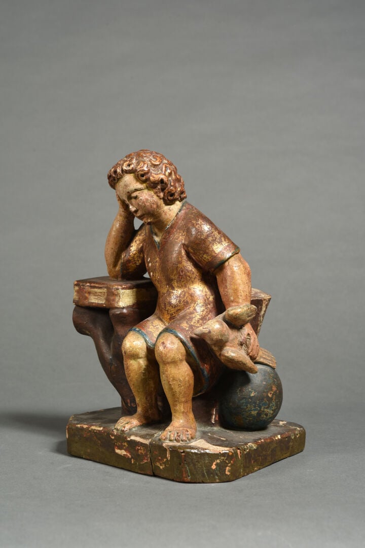 Enfant Jésus méditant en bois sculpté en ronde-bosse, polychromé et doré. Assis…
