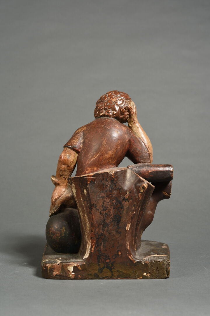 Enfant Jésus méditant en bois sculpté en ronde-bosse, polychromé et doré. Assis…