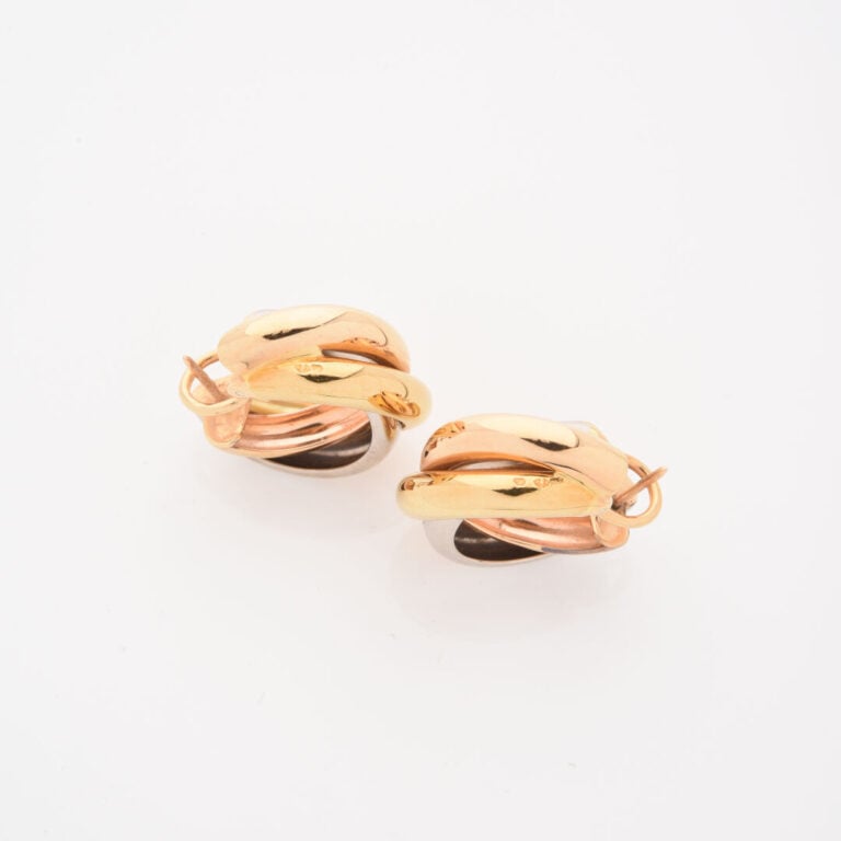 CARTIER - Paire de clips d'oreilles modèle Trinity en or (750) trois tons - Sig…