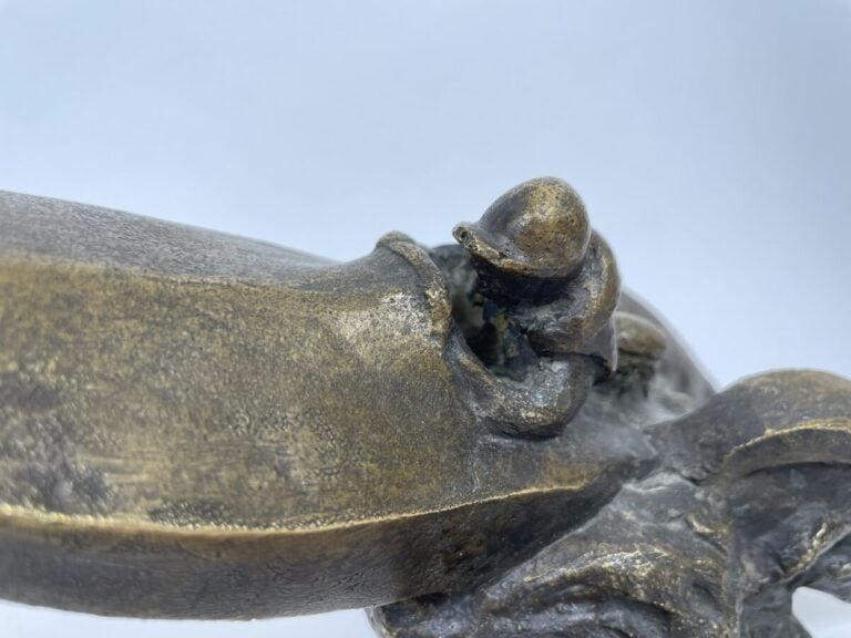LE CANOT A MOTEUR, VITESSE - Bronze à patine dorée, non signé - Hauteur : 13 cm…