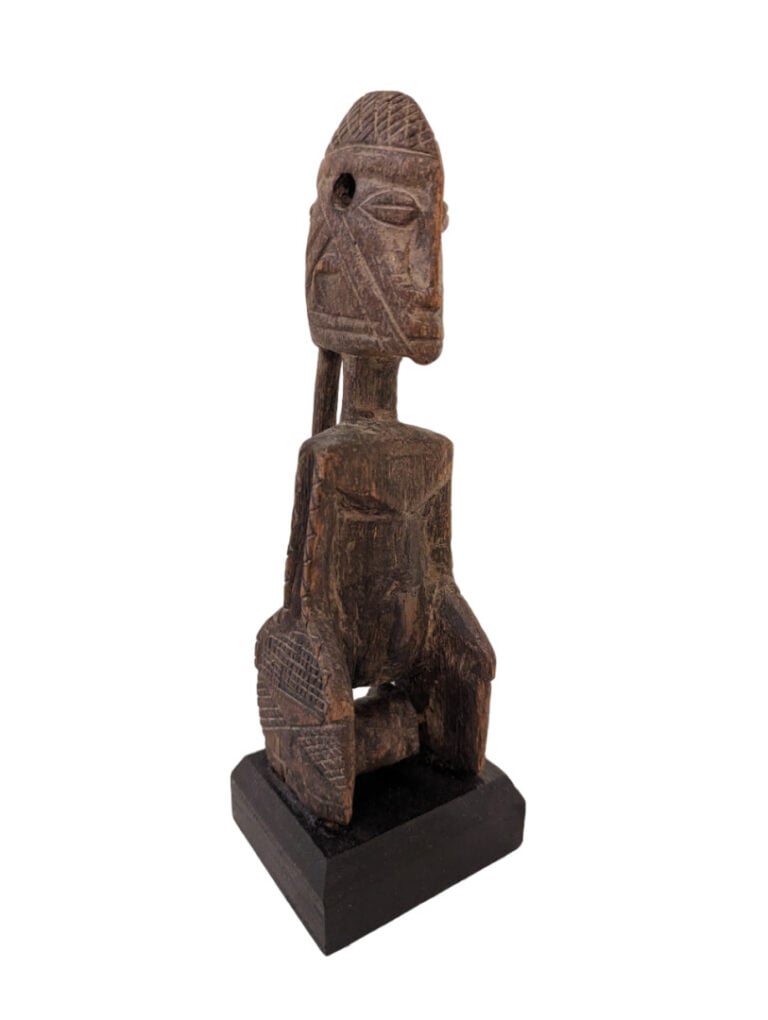 Lot de quatre objets : une poulie Bambara (Mali), un bronze, une pierre d'Océan…