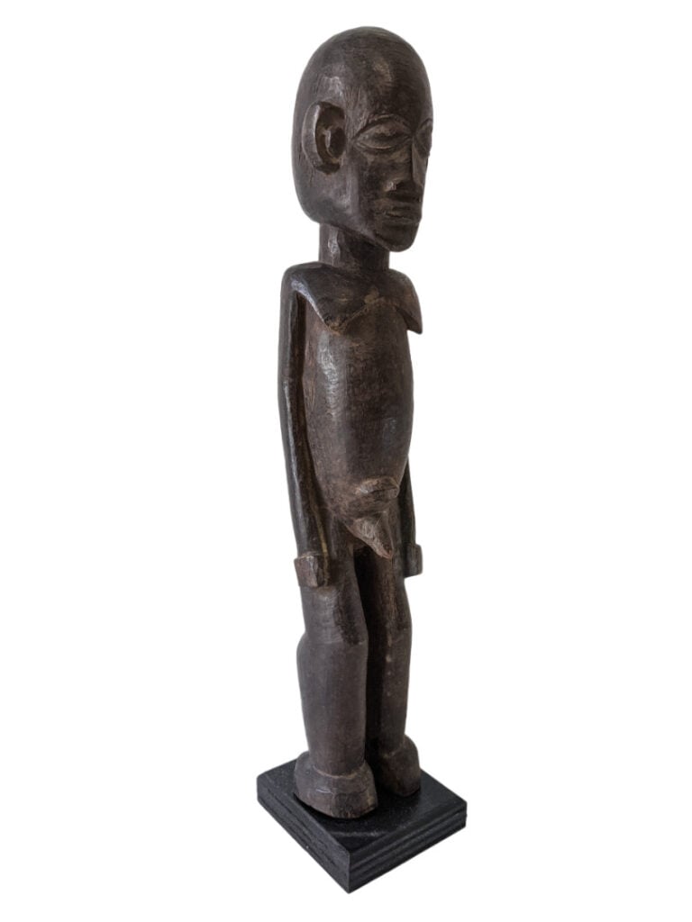 Lot de trois objets : deux fers oxydés Dogon (Mali) et une statuette Lobi (Burk…