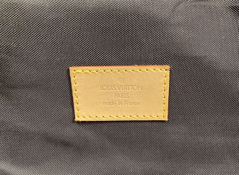 Louis VUITTON - Année 1997 - Porte-habits en toile monogram et cuir naturel, po…