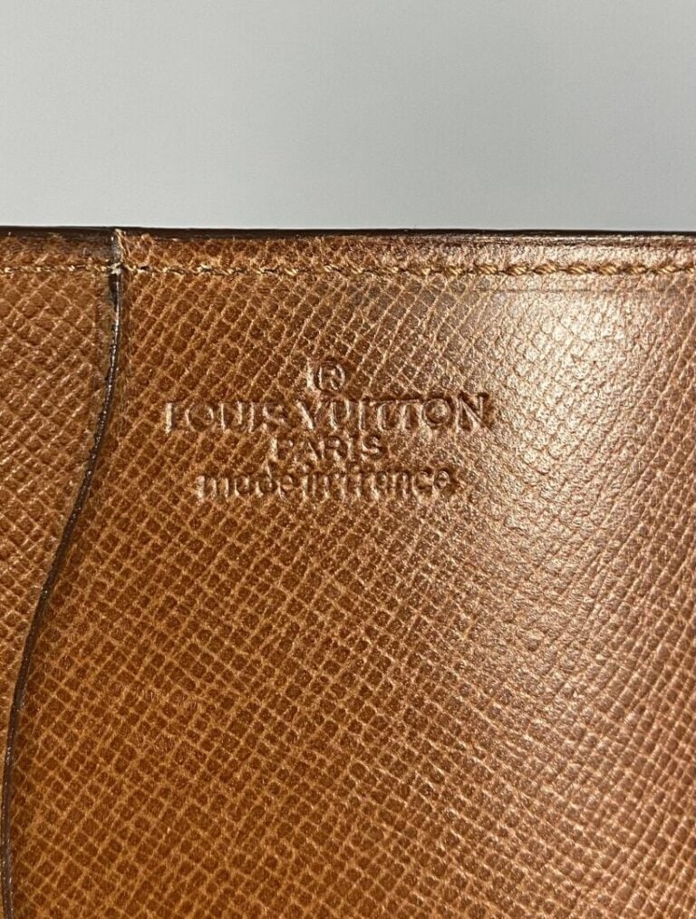 Louis VUITTON - Porte-chéquier en cuir naturel et toile Monogram