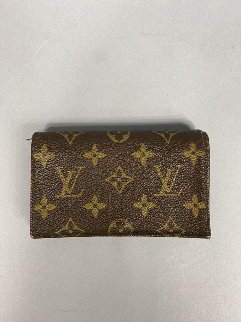 Louis VUITTON - Porte-monnaie en cuir marron et toile Monogram - 14 x 8.5 cm -…