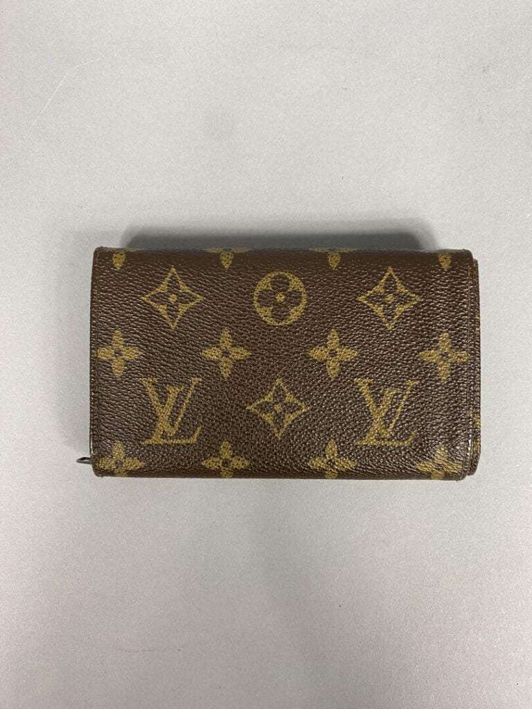 Louis VUITTON - Porte-monnaie en cuir marron et toile Monogram - 14 x 8.5 cm -…
