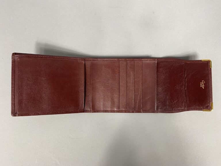 Must de CARTIER - Portefeuille en cuir bordeaux - Vers 1980