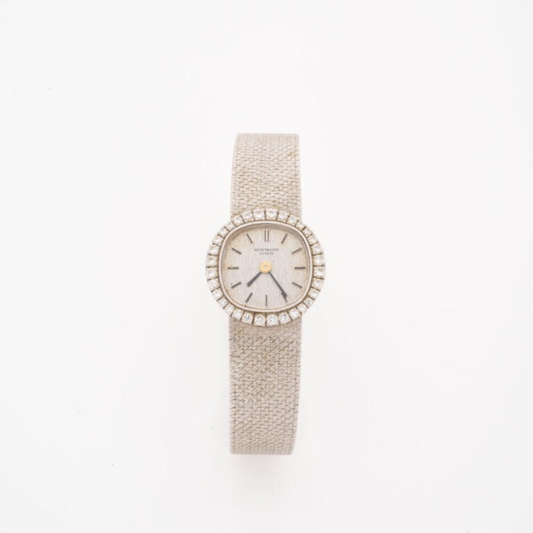 PATEK Philippe Genève - Montre bracelet de dame en or gris (750), boitier rond…