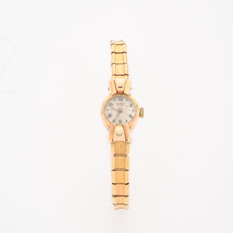 SIBER - Montre bracelet de dame en or jaune (750), boîtier rond à attaches de f…