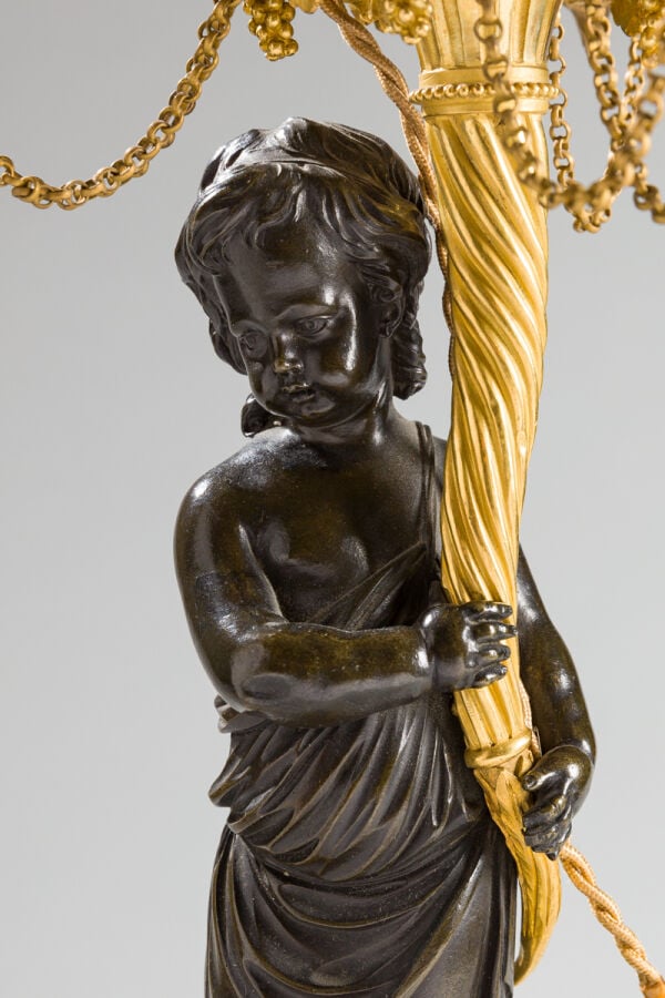 Candélabre à trois lumières en bronze ciselé, doré ou patiné et marbre bleu tur…